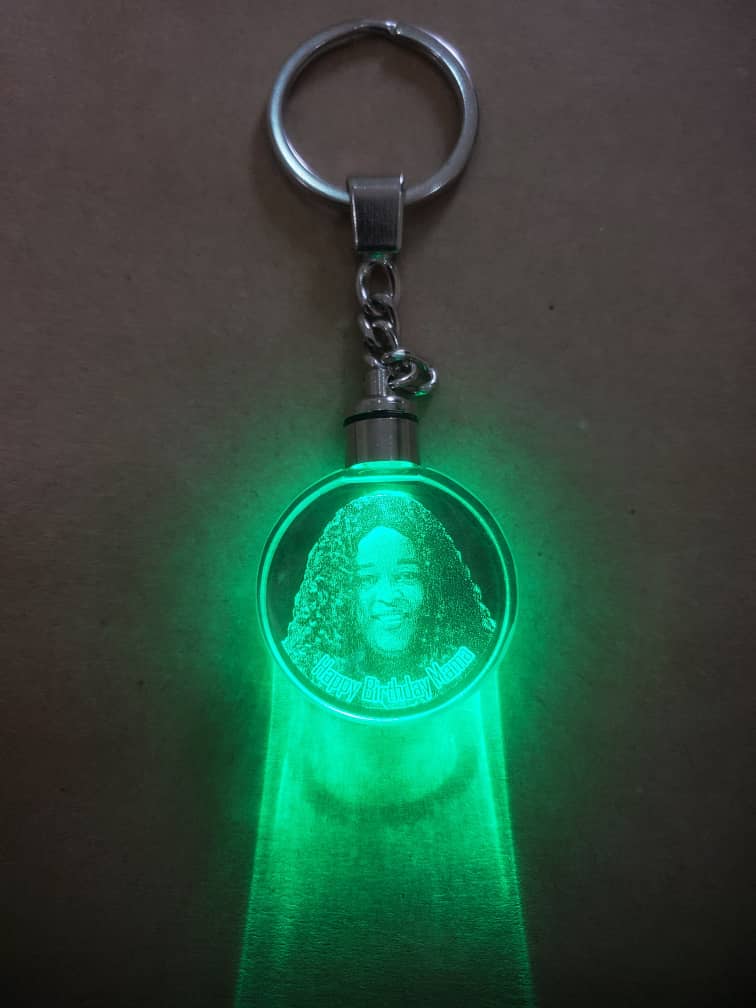 Mini 3D keyholder cube with custom image engraving and glowing light in Ghana